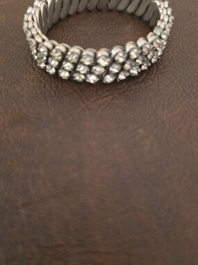 Vintage silver 1950's expansion bracelet features round white/colorless glass rh